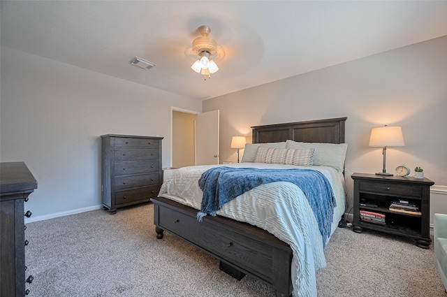 2322 Joel Wheaton Rd, Houston, TX 77077 - bedroom with light colored carpet, baseboards, and ceiling fan