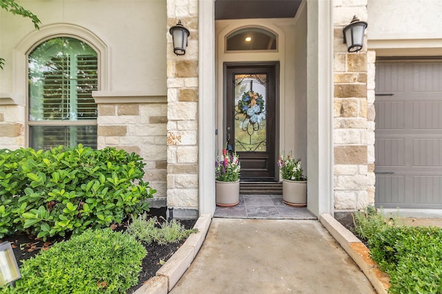 28249 Woodland Bend Way, Spring, TX 77386 - property entrance with stone siding and a garage