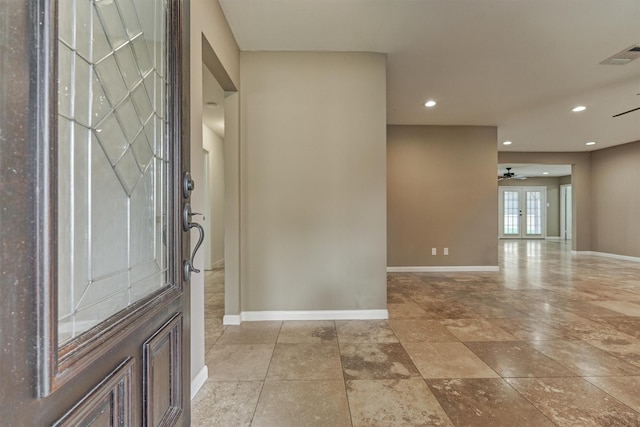 10411 Londonderry Dr, Houston, TX 77043 - entryway with ceiling fan, baseboards, and recessed lighting