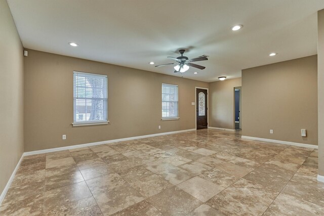 10411 Londonderry Dr, Houston, TX 77043 - unfurnished room featuring a ceiling fan, baseboards, and recessed lighting