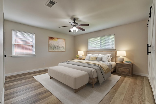 10411 Londonderry Dr, Houston, TX 77043 - bedroom with light wood-style flooring, baseboards, and ceiling fan