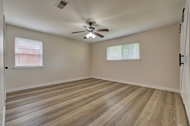 10411 Londonderry Dr, Houston, TX 77043 - unfurnished room featuring light wood-type flooring, ceiling fan, and baseboards