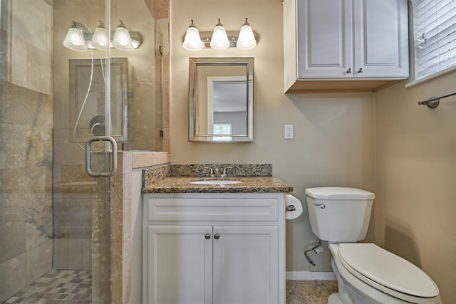 10411 Londonderry Dr, Houston, TX 77043 - bathroom featuring toilet, vanity, and a shower stall
