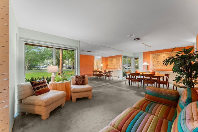 9809 Neuens Rd, Houston, TX 77080 - carpeted living area featuring healthy amount of natural light