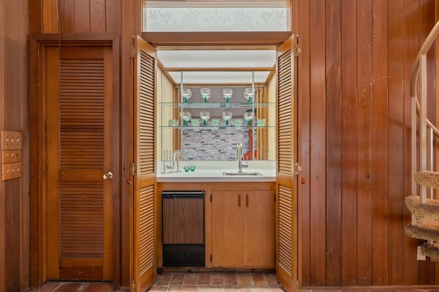 9809 Neuens Rd, Houston, TX 77080 - indoor wet bar featuring wooden walls and stairs