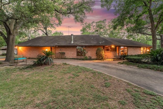 9809 Neuens Rd, Houston, TX 77080 - view of front of home with brick siding and driveway