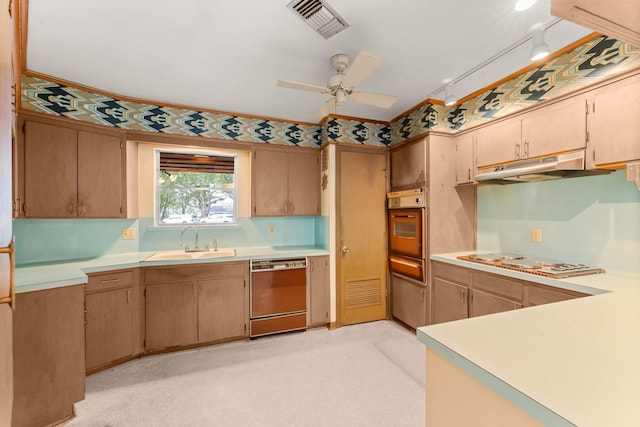 9809 Neuens Rd, Houston, TX 77080 - kitchen with dishwasher, under cabinet range hood, a sink, cooktop, and oven