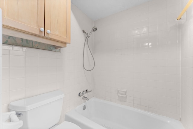 9809 Neuens Rd, Houston, TX 77080 - full bathroom featuring shower / bathtub combination, toilet, and tile walls