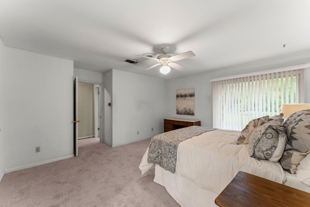 9809 Neuens Rd, Houston, TX 77080 - carpeted bedroom featuring ceiling fan and baseboards