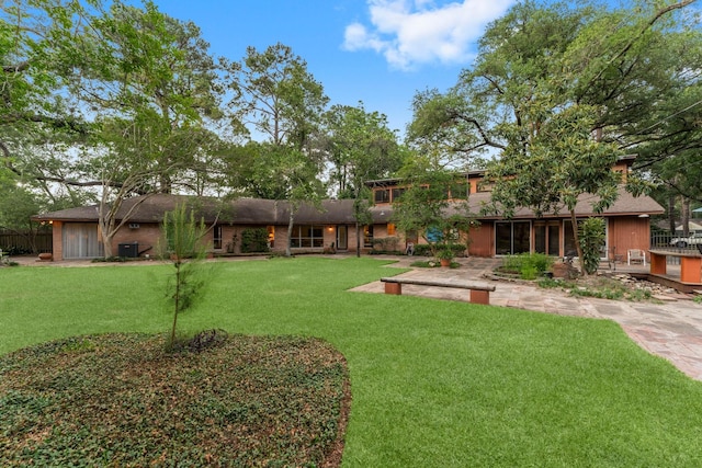 9809 Neuens Rd, Houston, TX 77080 - view of grassy yard with cooling unit