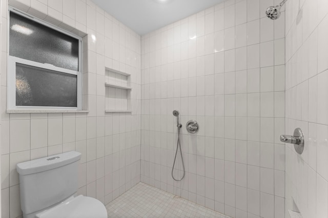 9809 Neuens Rd, Houston, TX 77080 - full bath with tiled shower, toilet, and tile walls