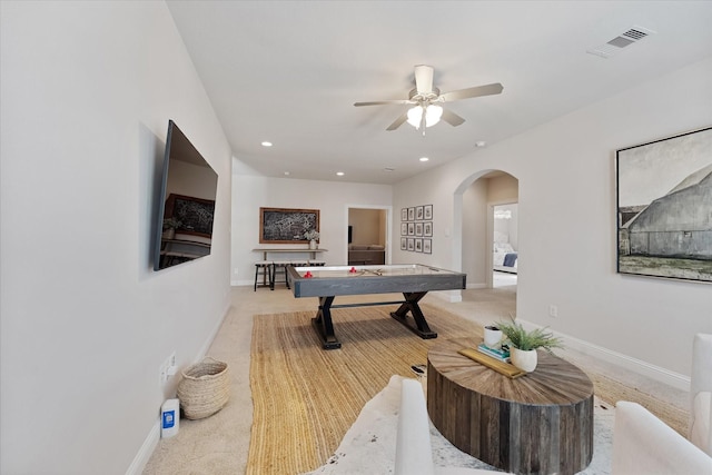 5823 Stratton Woods Dr, Spring, TX 77389 - playroom featuring a ceiling fan, arched walkways, light colored carpet, baseboards, and recessed lighting
