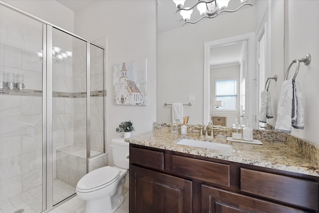 5823 Stratton Woods Dr, Spring, TX 77389 - full bath with toilet, vanity, a stall shower, ornamental molding, and a chandelier