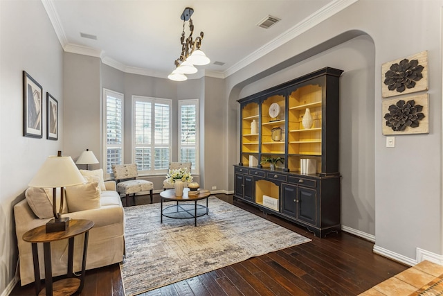 7014 Lake Haven Ct, Sugar Land, TX 77479 - living room with dark wood-style floors, baseboards, and crown molding