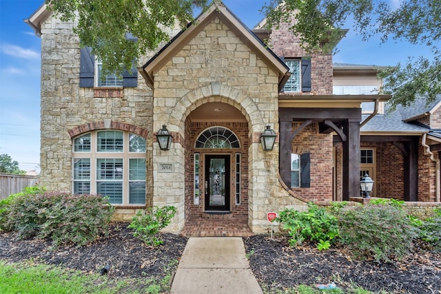 7014 Lake Haven Ct, Sugar Land, TX 77479 - property entrance featuring stone siding and brick siding