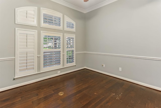 7014 Lake Haven Ct, Sugar Land, TX 77479 - spare room featuring ornamental molding, dark wood-style flooring, and baseboards