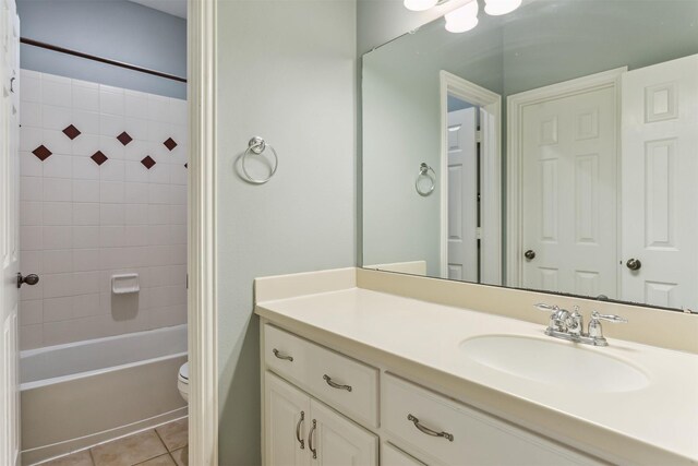 7014 Lake Haven Ct, Sugar Land, TX 77479 - bathroom with tile patterned flooring, vanity, toilet, and shower / bath combination