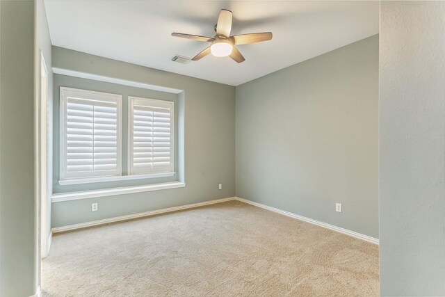 7014 Lake Haven Ct, Sugar Land, TX 77479 - carpeted spare room with ceiling fan and baseboards