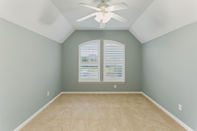 7014 Lake Haven Ct, Sugar Land, TX 77479 - additional living space with a ceiling fan, light colored carpet, vaulted ceiling, and baseboards