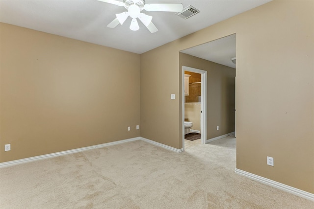 7014 Lake Haven Ct, Sugar Land, TX 77479 - empty room featuring a ceiling fan, light colored carpet, and baseboards
