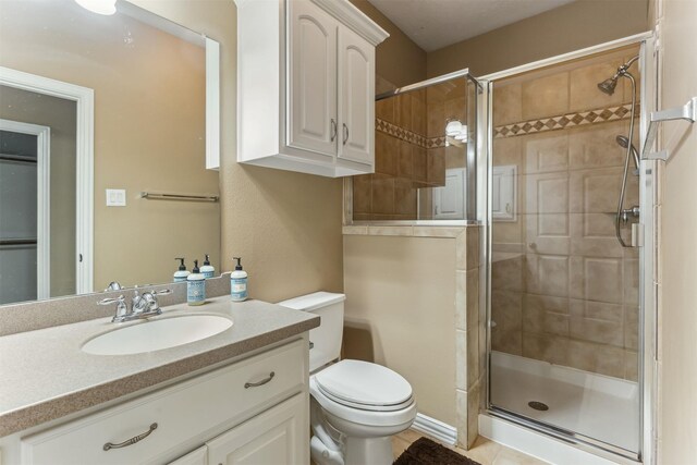 7014 Lake Haven Ct, Sugar Land, TX 77479 - full bath with a stall shower, vanity, and toilet
