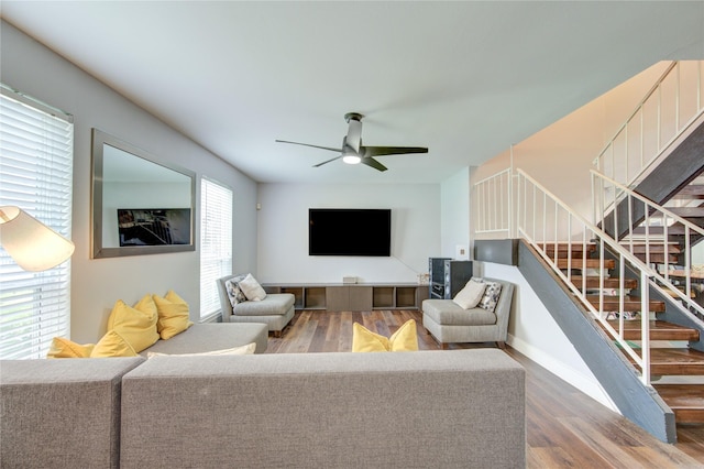 2246 Triway Ln, Houston, TX 77043 - living area with stairway, wood finished floors, a ceiling fan, and baseboards