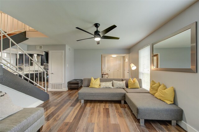 2246 Triway Ln, Houston, TX 77043 - living room with wood finished floors, stairway, ceiling fan, and baseboards