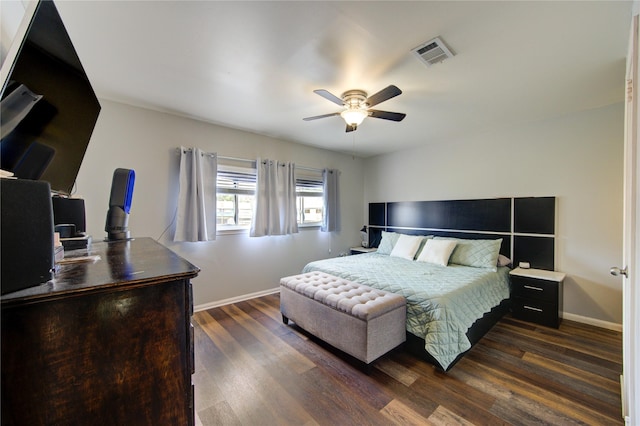 2246 Triway Ln, Houston, TX 77043 - bedroom with baseboards, dark wood-style floors, and ceiling fan
