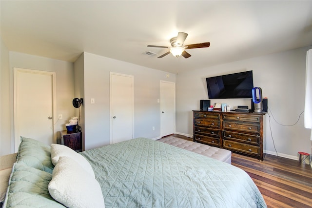2246 Triway Ln, Houston, TX 77043 - bedroom with baseboards, wood finished floors, and a ceiling fan