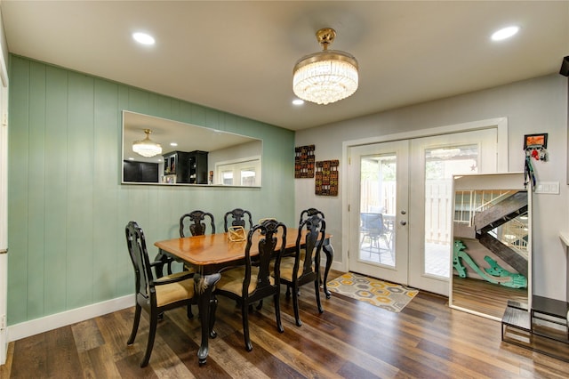2246 Triway Ln, Houston, TX 77043 - dining room with french doors, wood finished floors, a chandelier, baseboards, and recessed lighting