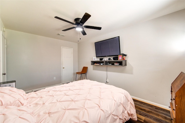 2246 Triway Ln, Houston, TX 77043 - bedroom with wood finished floors, baseboards, and ceiling fan