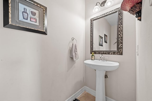 8910 Cote Ct, Houston, TX 77064 - bathroom featuring baseboards
