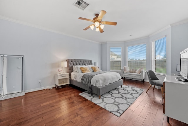 8910 Cote Ct, Houston, TX 77064 - bedroom with ornamental molding, wood finished floors, baseboards, and ceiling fan