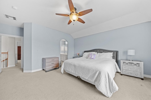 8910 Cote Ct, Houston, TX 77064 - carpeted bedroom featuring baseboards, vaulted ceiling, connected bathroom, and a ceiling fan