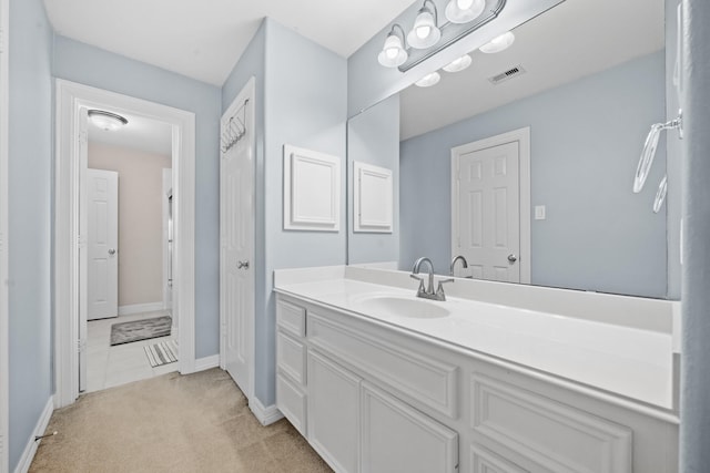 8910 Cote Ct, Houston, TX 77064 - bathroom with vanity and baseboards