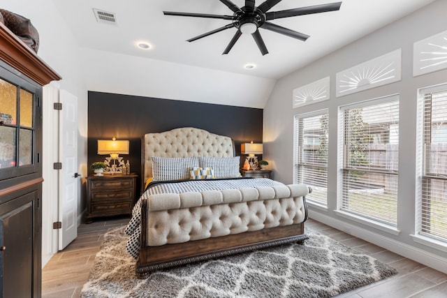 17185 Foxtrot Way, Conroe, TX 77302 - bedroom featuring wood finish floors, baseboards, vaulted ceiling, recessed lighting, and ceiling fan
