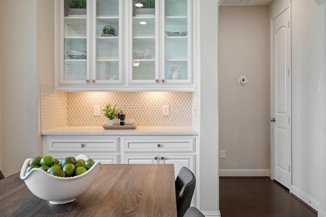 18735 Evanhale Bend Dr, Cypress, TX 77429 - dining space with dark wood-type flooring and baseboards