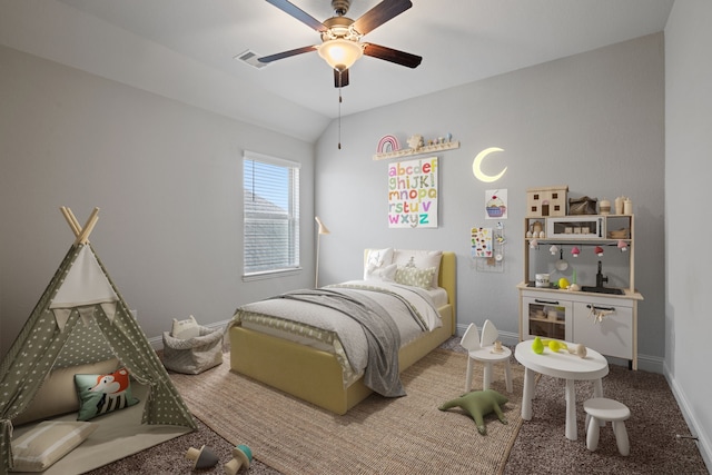 18735 Evanhale Bend Dr, Cypress, TX 77429 - carpeted bedroom with baseboards, vaulted ceiling, and a ceiling fan