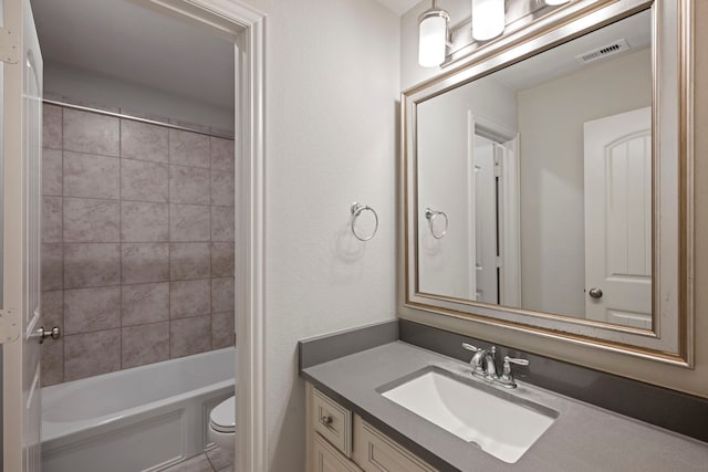 18735 Evanhale Bend Dr, Cypress, TX 77429 - bathroom with vanity, toilet, and bathtub / shower combination
