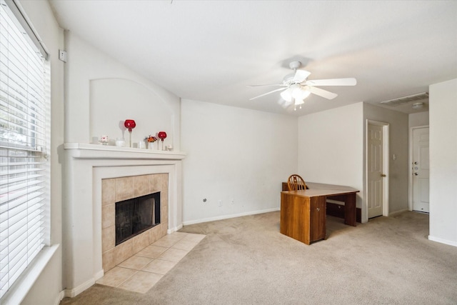 20203 Stonegrove Ct, Tomball, TX 77375 - unfurnished living room featuring carpet flooring, a tile fireplace, a ceiling fan, and baseboards