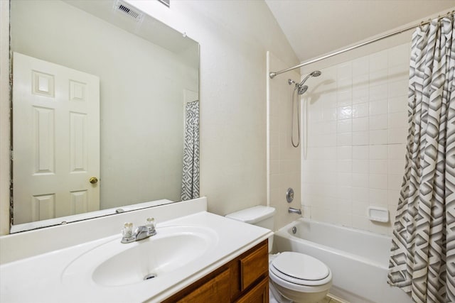 20203 Stonegrove Ct, Tomball, TX 77375 - bathroom with shower / tub combo, toilet, vanity, and lofted ceiling