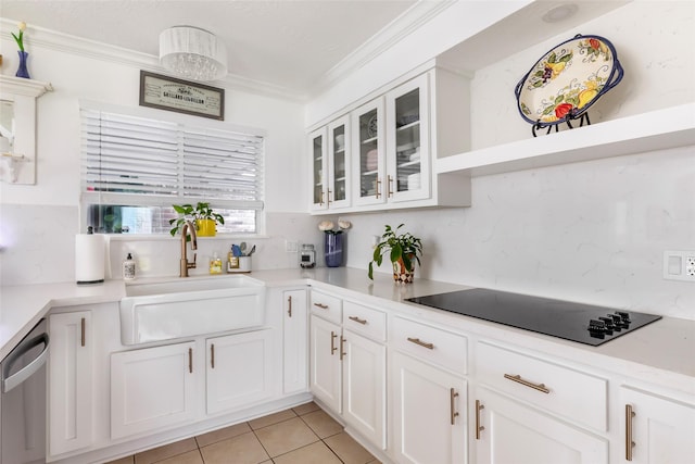 12121 Maverick Dr, Willis, TX 77378 - kitchen featuring a sink, black electric stovetop, dishwasher, crown molding, and white cabinetry