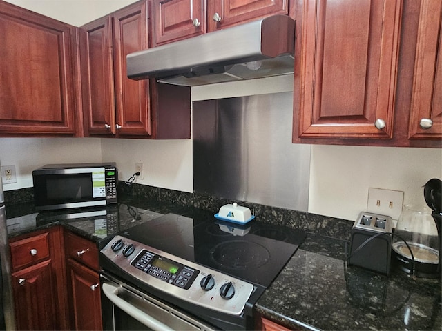 7575 Kirby Dr Unit 1104, Houston, TX 77030 - kitchen with stainless steel electric range oven, under cabinet range hood, and dark stone counters