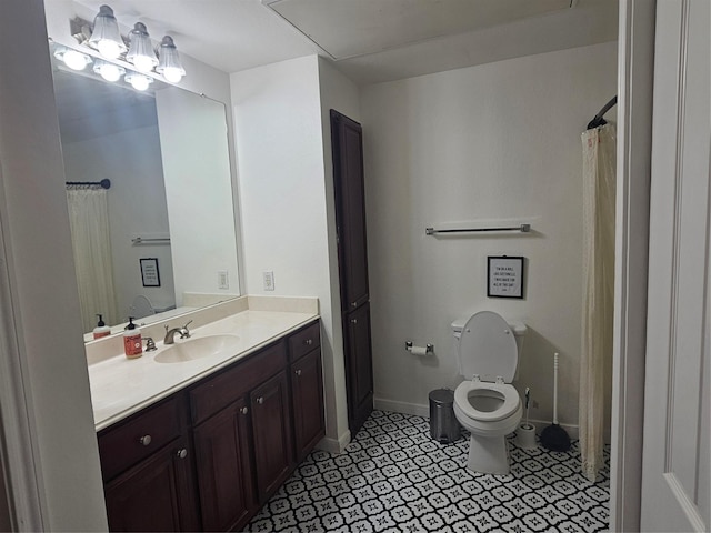 7575 Kirby Dr Unit 1104, Houston, TX 77030 - bathroom featuring vanity, toilet, and baseboards