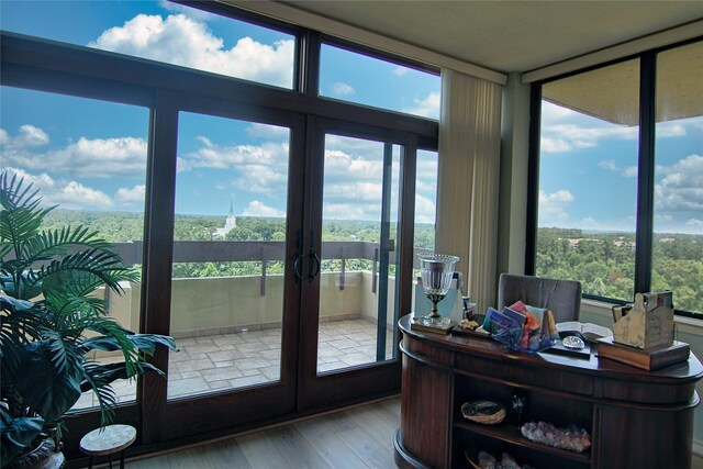 14655 Champion Forest Dr Unit 1102, Houston, TX 77069 - entryway with wood finished floors and french doors