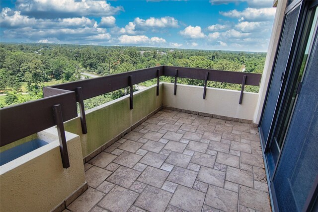 14655 Champion Forest Dr Unit 1102, Houston, TX 77069 - balcony with a view of trees