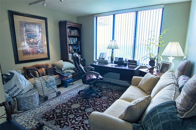 14655 Champion Forest Dr Unit 1102, Houston, TX 77069 - carpeted living area featuring an office area and rail lighting