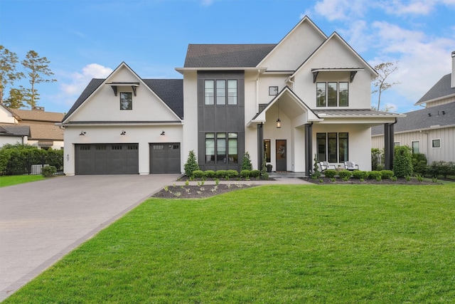 407 N Copa Palm Loop, Montgomery, TX 77316 - view of front of house featuring stucco siding, asphalt driveway, a front lawn, and a standing seam roof
