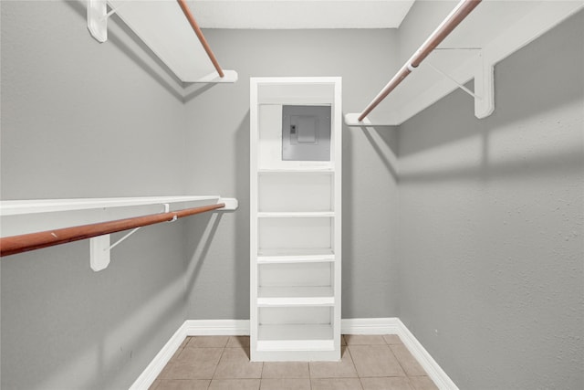 8385 Sands Point Dr Unit 5, Houston, TX 77036 - walk in closet with electric panel and light tile patterned floors