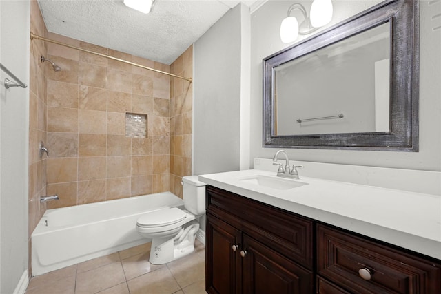 8385 Sands Point Dr Unit 5, Houston, TX 77036 - full bathroom featuring toilet, vanity, tile patterned flooring, washtub / shower combination, and a textured ceiling